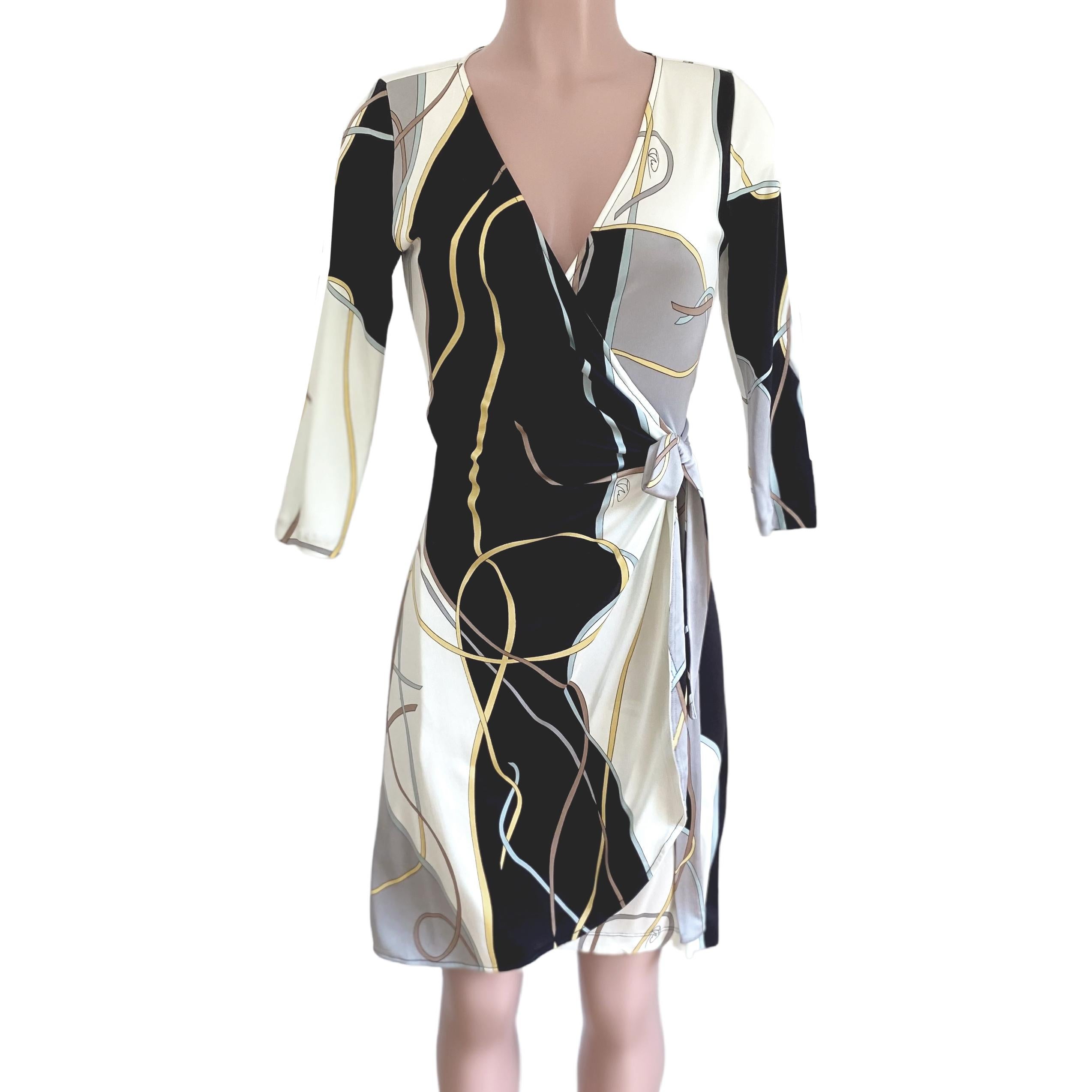 From FLORA KUNG collection - New with tag.
True wrap dress with 3/4 bell sleeves, in Flora's original ribbon print.
Flattering true wrap.
Authentic FLORA KUNG silk dresses are made in premiere quality, long-filament silk yarn which gives a natural