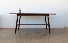 Misterioso Dining Table in Walnut with Hand Shaped Base