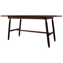 Misterioso Dining Table in Walnut with Hand Shaped Base