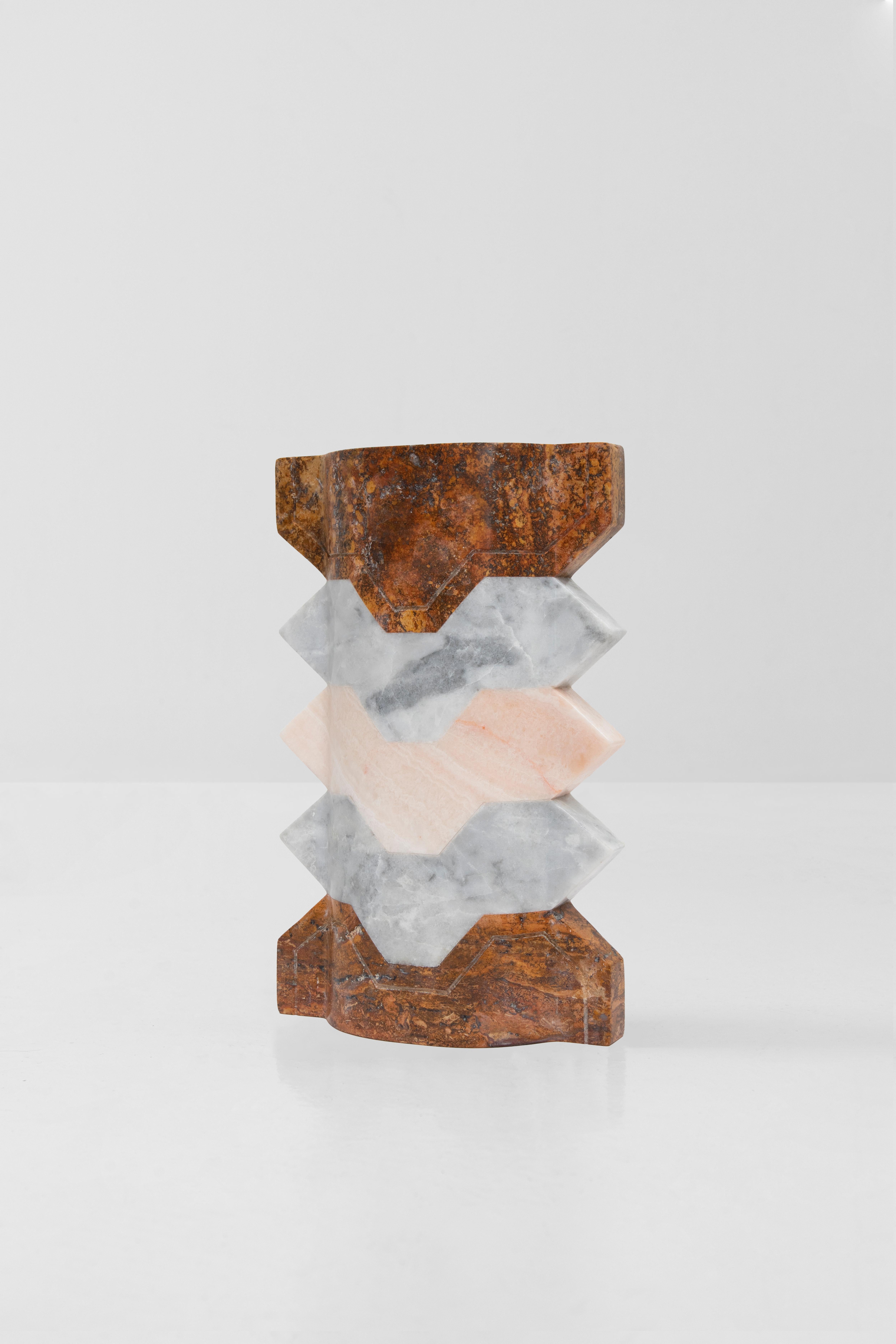 Pink onyx, red travertine and white Venetian marble.
Edition of 10 + 2 AP

**As this work is made of natural stone, color and veins may vary from the photo**
Handcrafted in Mexico

The inspiration for these pieces draws deeply from the ancient and