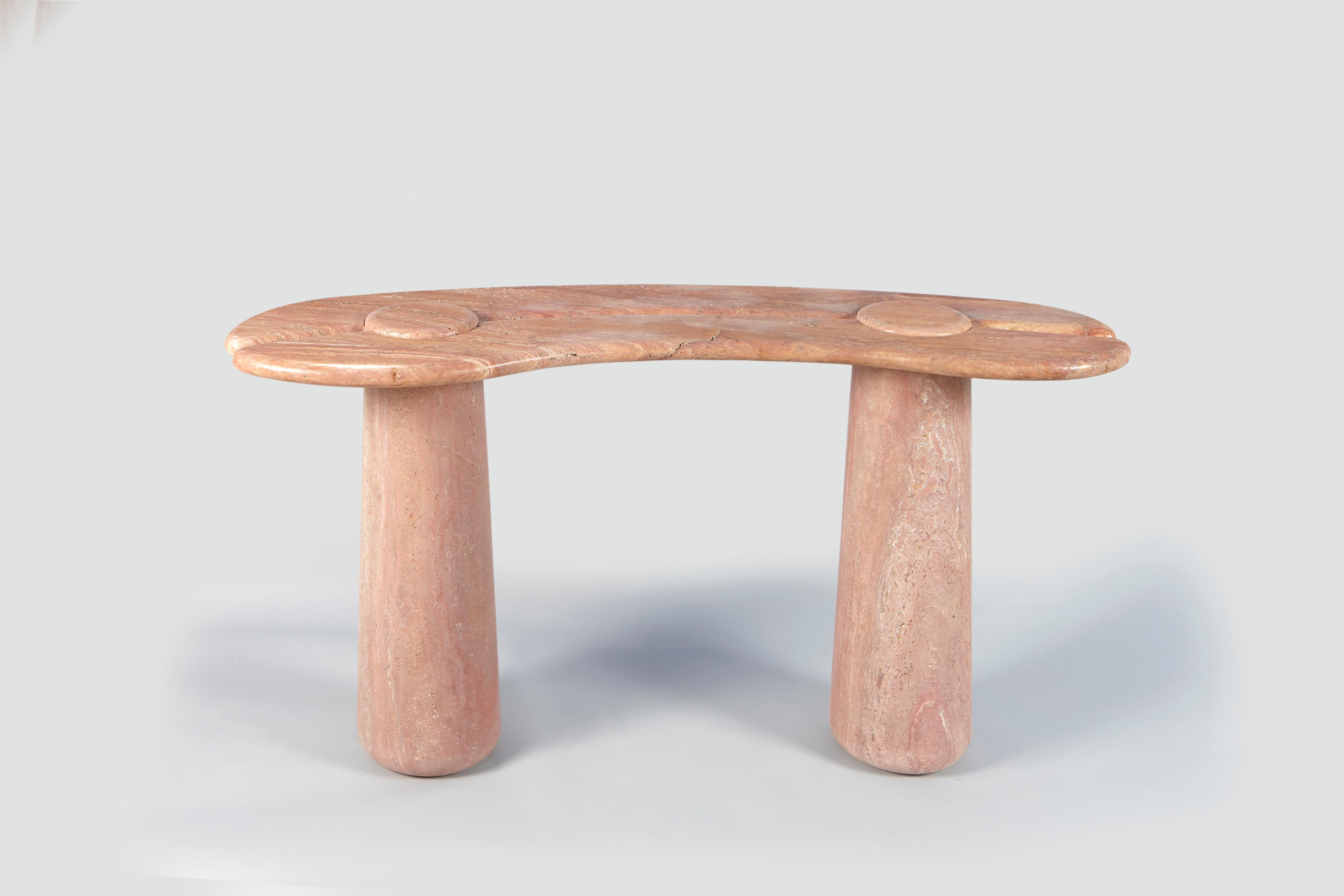 Mistral Console by Studio Bazazo
Dimensions: D 65 x W 180 x H 100 cm. 
Materials: Travertino Rosso and stainless steel.

Light as a breeze with the force to shape landscapes, the “Mistral” collection is a voyage to a moment of relief by the