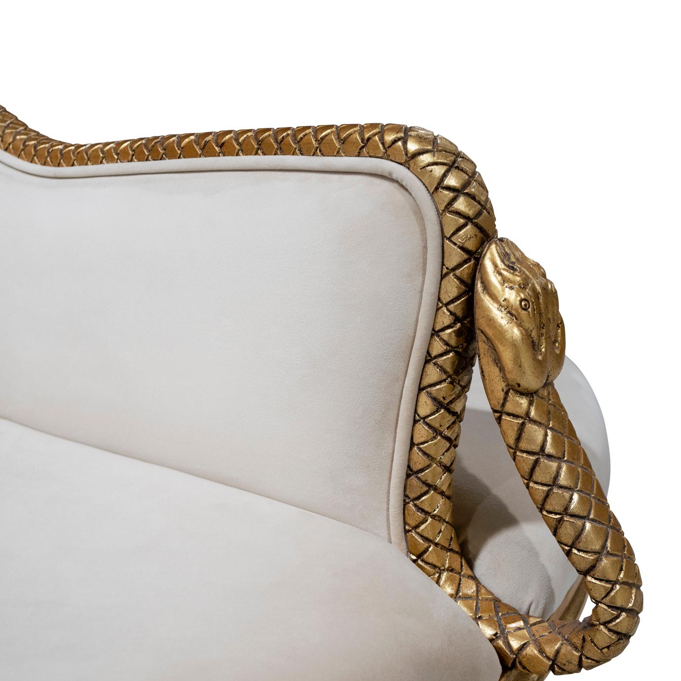Menacing and mesmerizing hand-carved serpents embody an exotic, untouchable yet sensual aura giving the Mistress confidante the power to capture and seduce in every way.