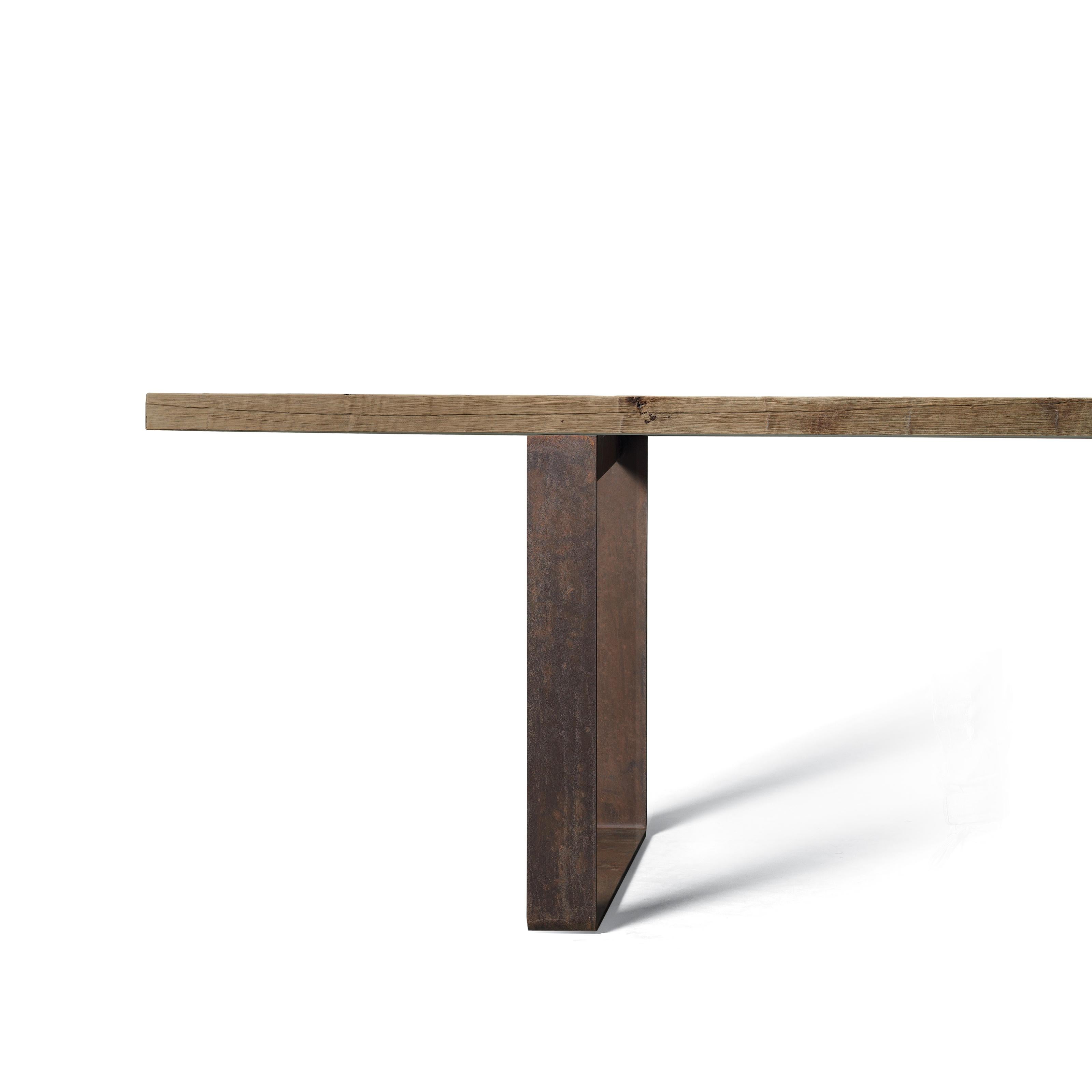 A contemporary design expression of the high-quality Italian craftsmanship. The top it’s made in premium old alder and the base is in rust iron giving it a refined industrial touch. We only use high-quality wood so every table has its