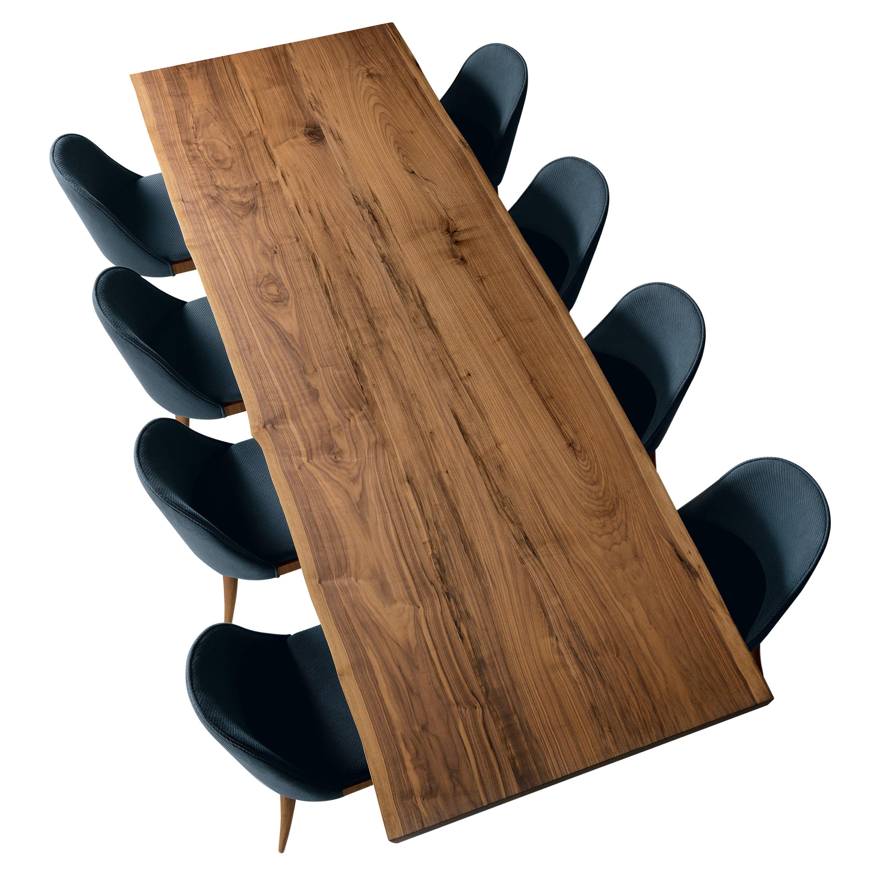 A refined and simple design, where the top in premium solid walnut in natural oil finish is the protagonist. Handmade in Italy, it’s the result of fine craftsmanship and passion for details. This table was created to express in its design the beauty