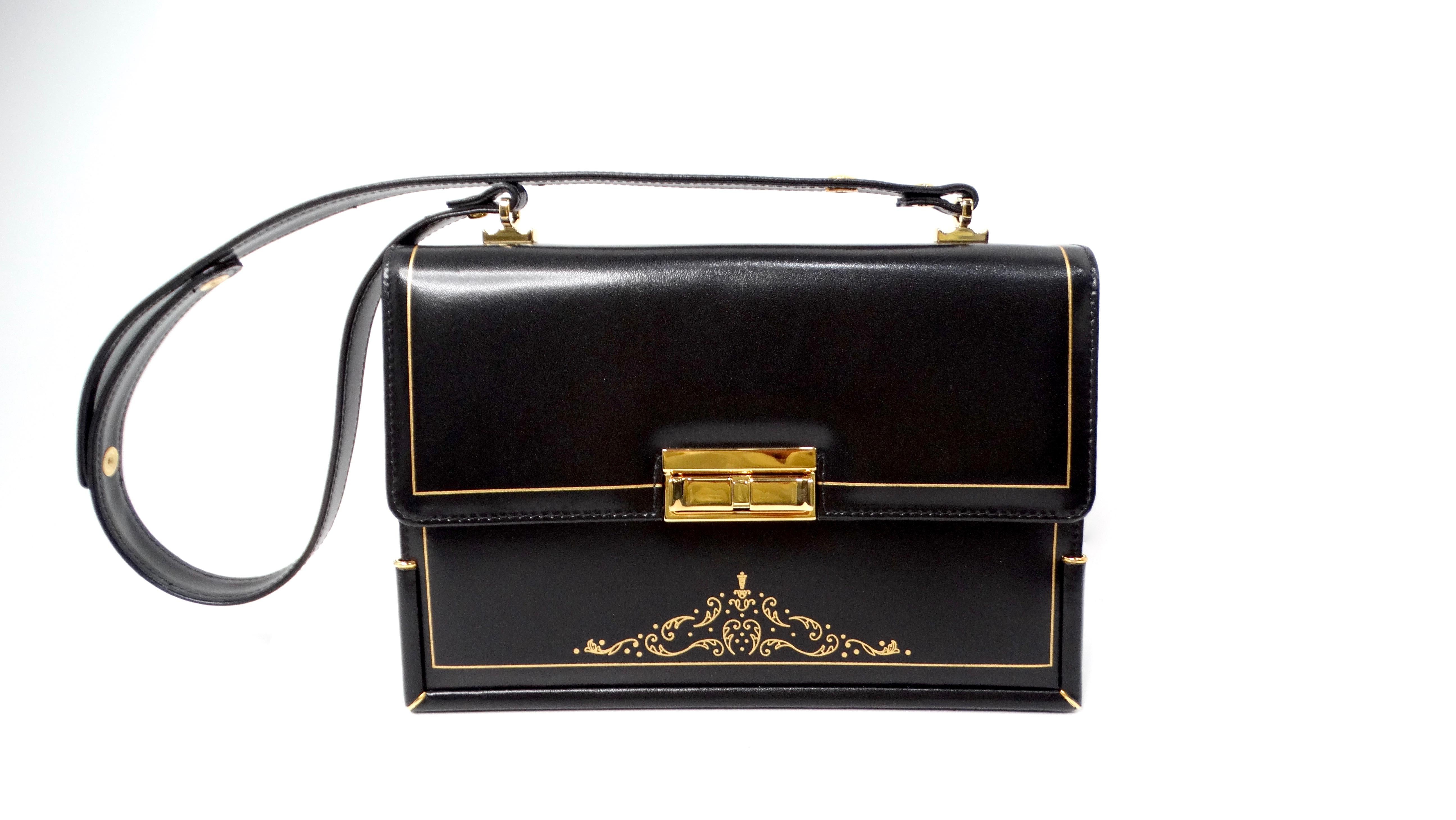 The Misuri Custom Italian Black Leather Shoulder Bag is a chic and sophisticated accessory that embodies a perfect blend of functionality and style. Crafted from premium black leather, this structured messenger-style shoulder bag features a custom