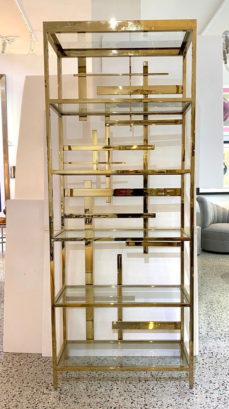 This stylish brass etagere by Mitchel Gold will make a statement with its abstract-fretwork form and golden brass finish. 






