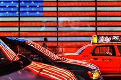 American Flag in Neon in New York City Street Scene at Night