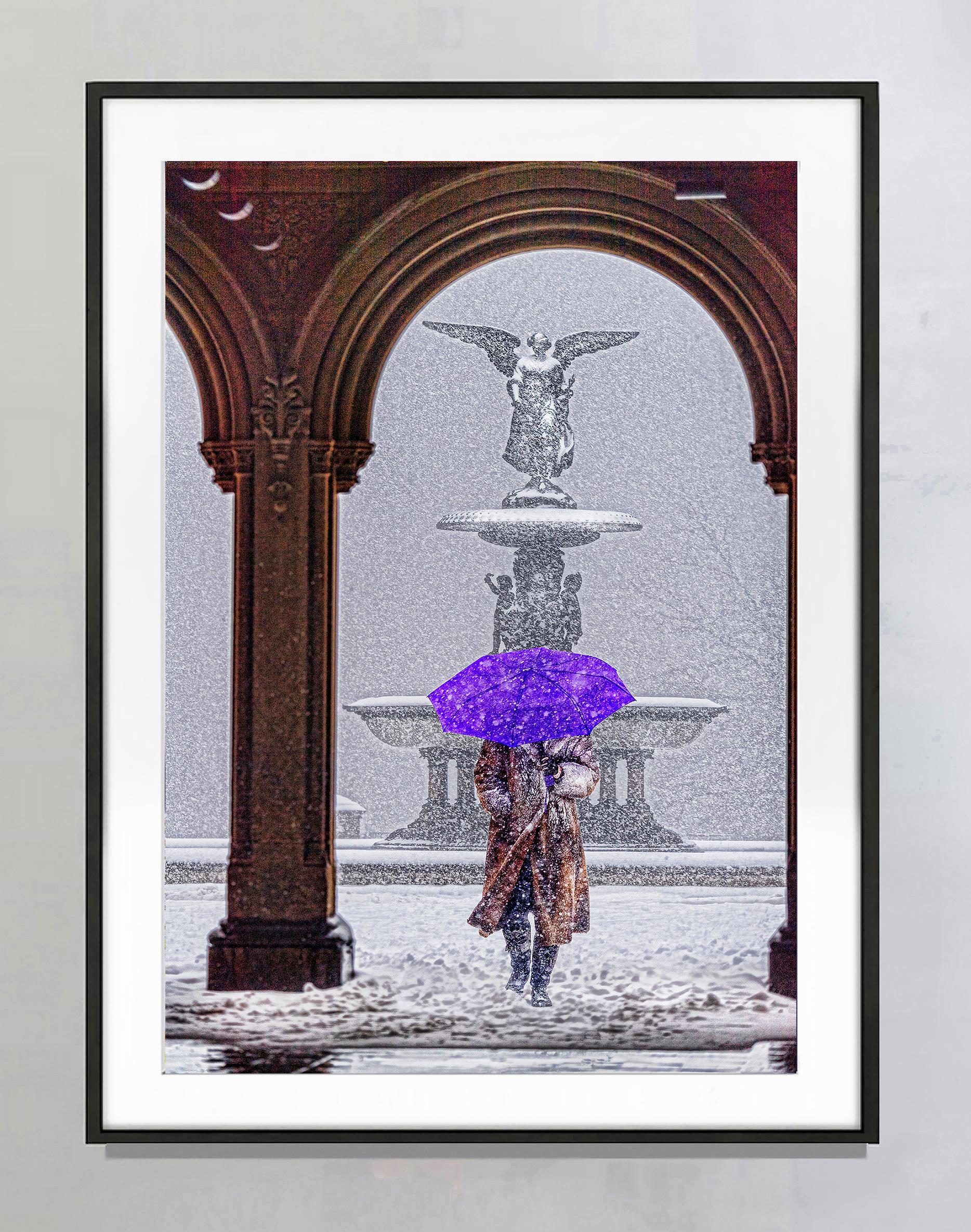 Bethesda fountain Central Park in Snow With Purple Umbrella - Photograph by Mitchell Funk