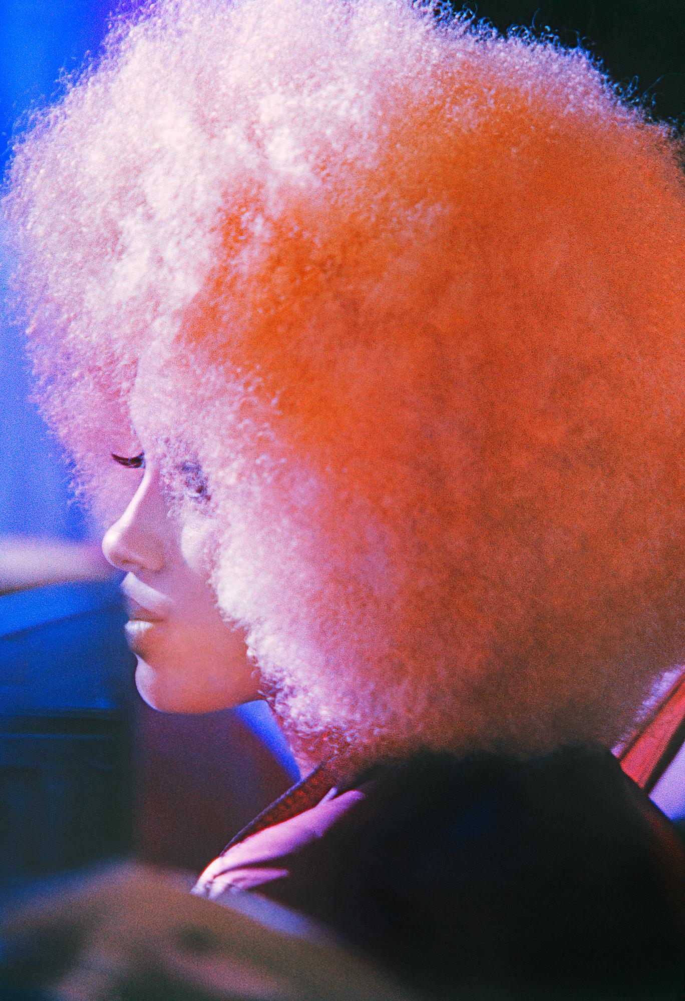 Mitchell Funk Portrait Photograph - Black Hippie with Blond Afro, Washington Square Park - Henri Ghent Black Curator
