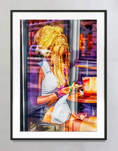 Black Woman with Flamboyant Hair at Cafe