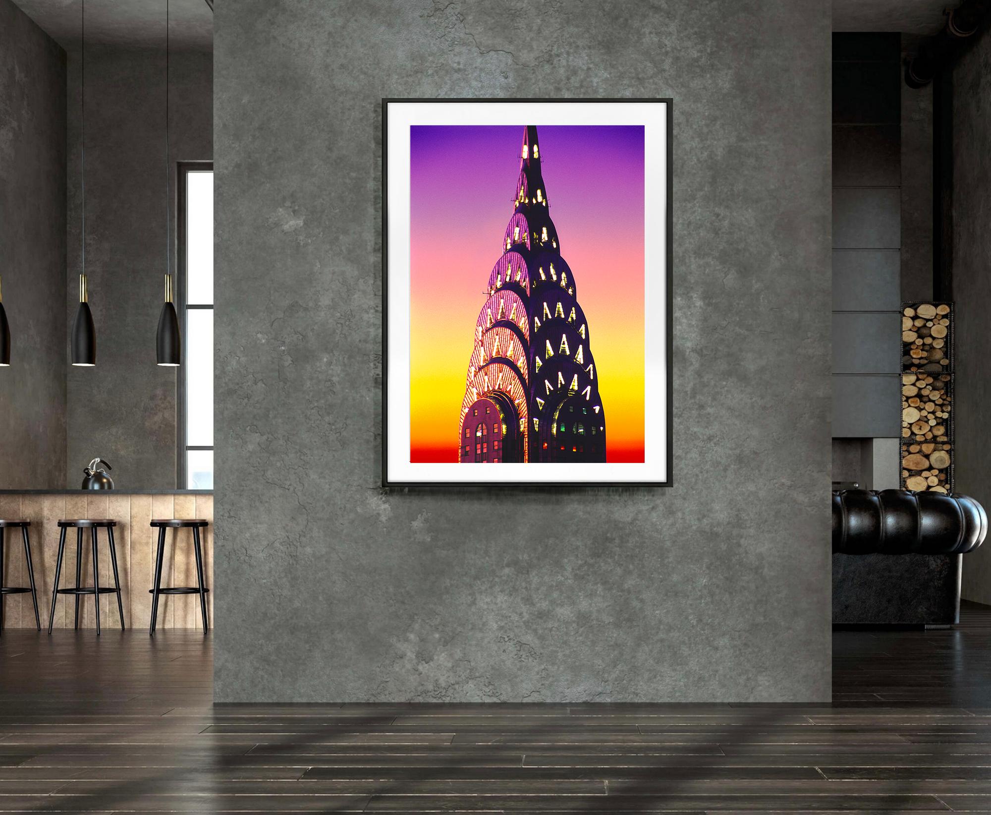 Corona del Chrysler Building di notte con cielo luminoso - Color Photograph Arancia di Mitchell Funk