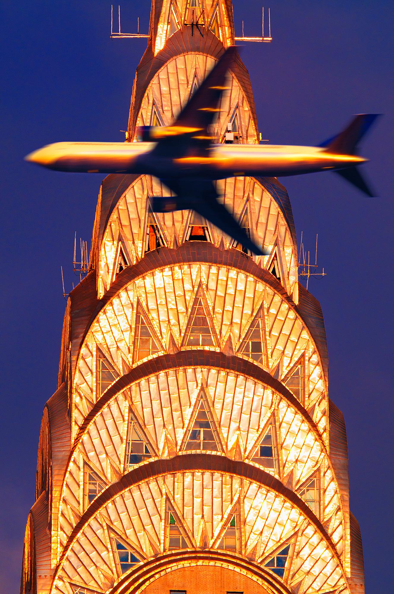 Mitchell Funk Color Photograph - Chrysler Building Spire in Golden Light Intersected with Airplane,  Art Deco