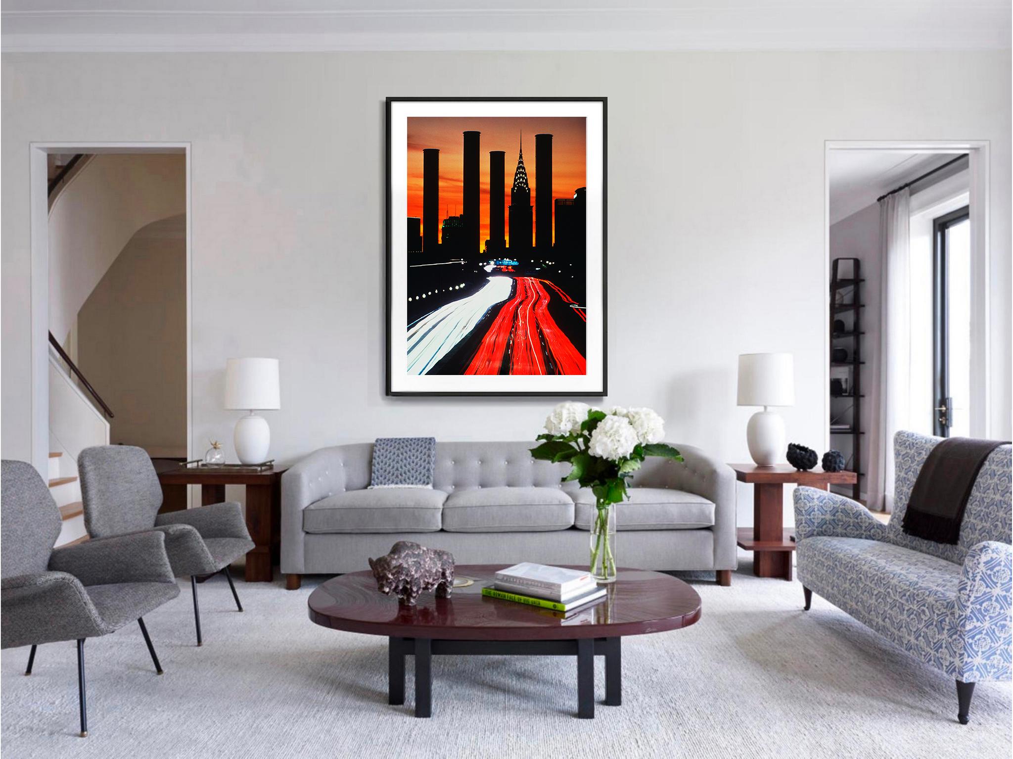 Before Long Island City blossomed into a landscape of high-rise residential development, it was a gritty industrial area.  One of the iconic images of the LIC was four monumental smokestacks from an abandoned factory.  Photographer Mitchell Funk