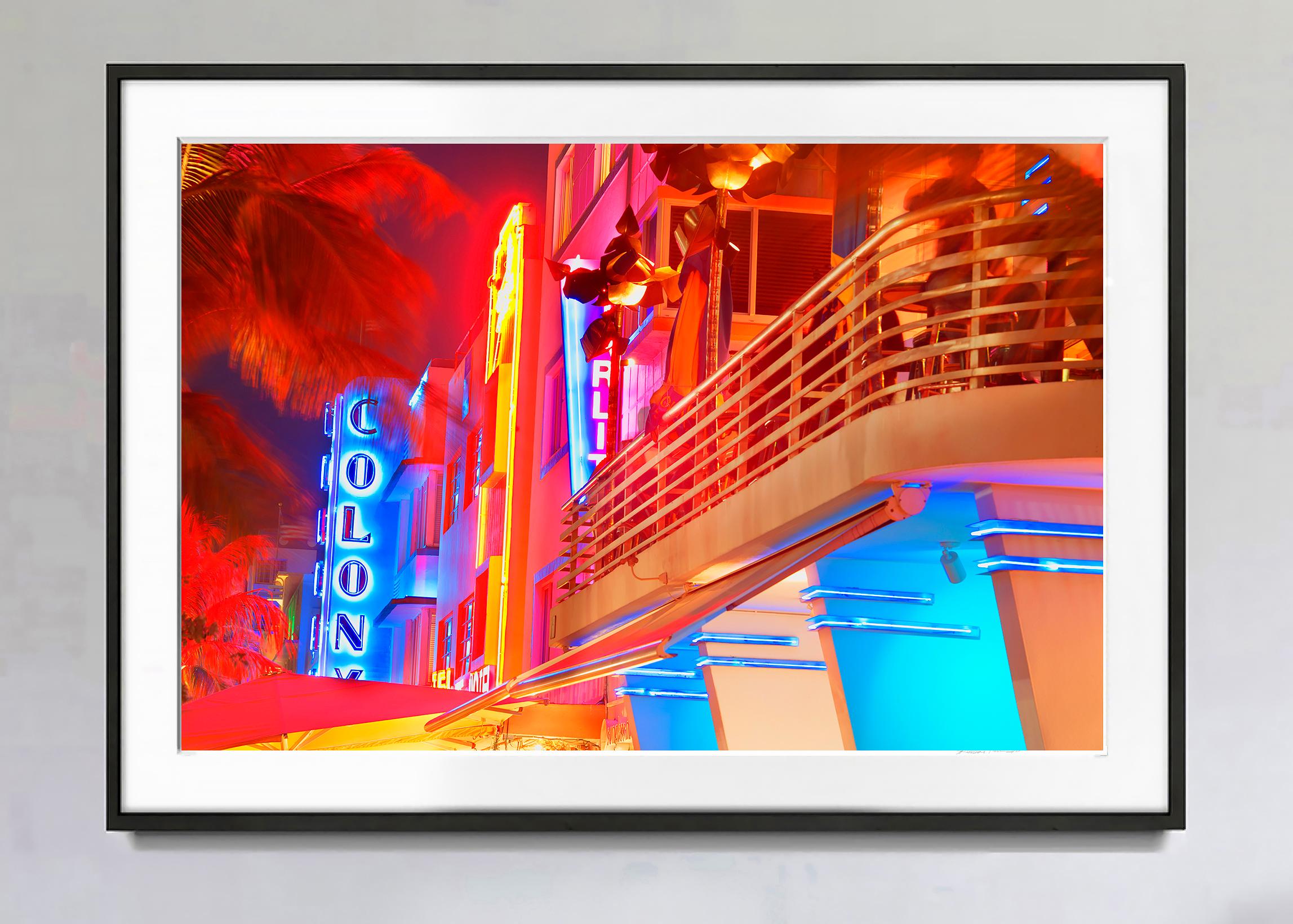 Colony Hotel Ocean Drive, South Beach at Night  Tropical Neon Reds and Neon Blue - Photograph by Mitchell Funk