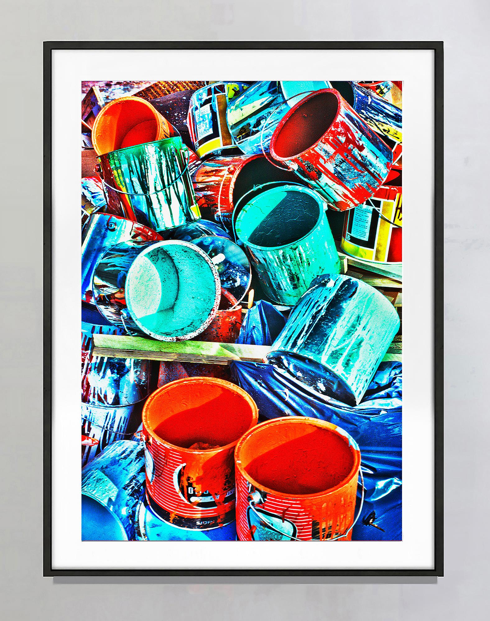 Colorful Paint Cans in Red, Orange, Blue and Turquoise  - Photograph by Mitchell Funk