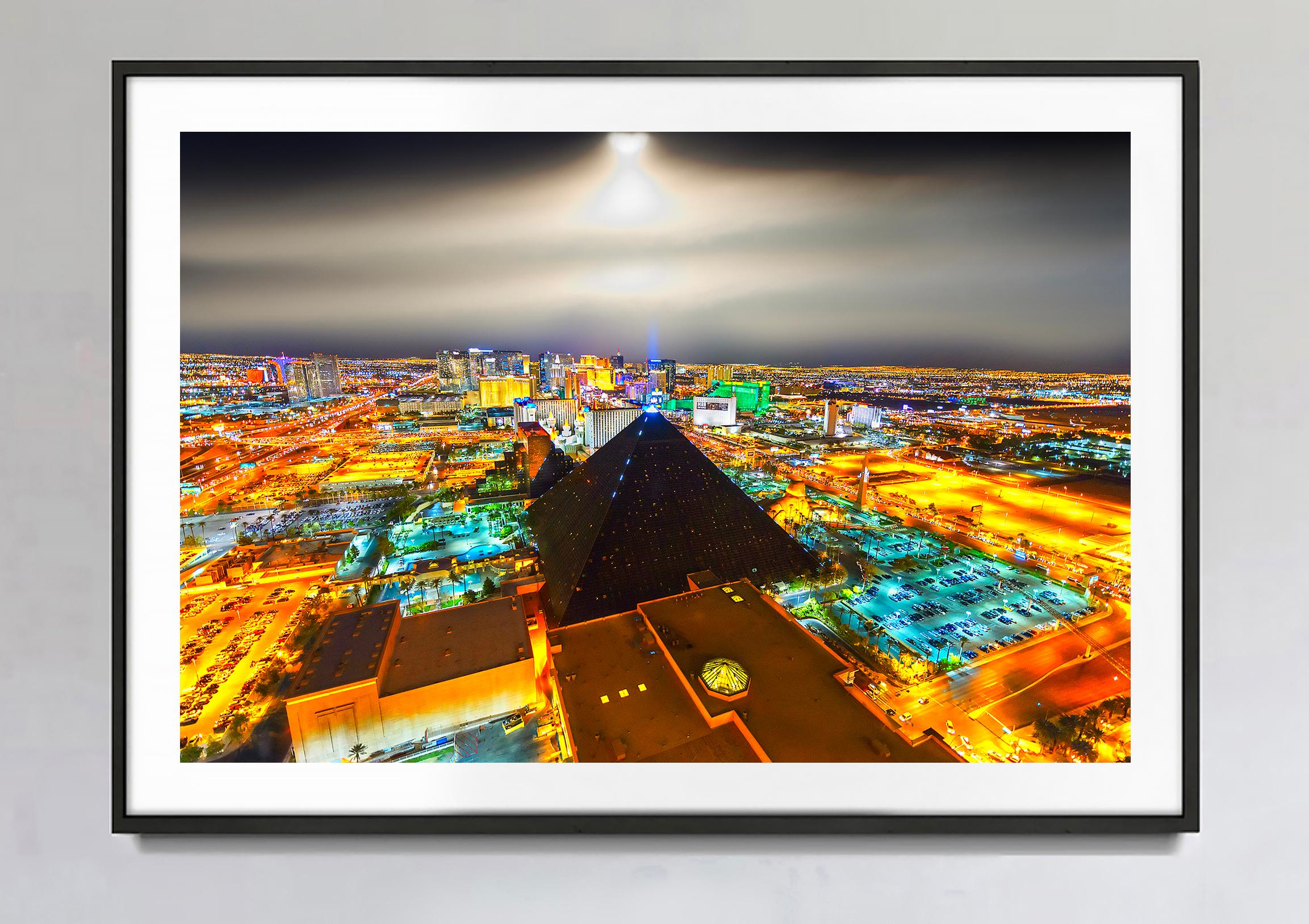 Elevated View Of Las Vegas At Night With Moonlit Sky - Photograph by Mitchell Funk