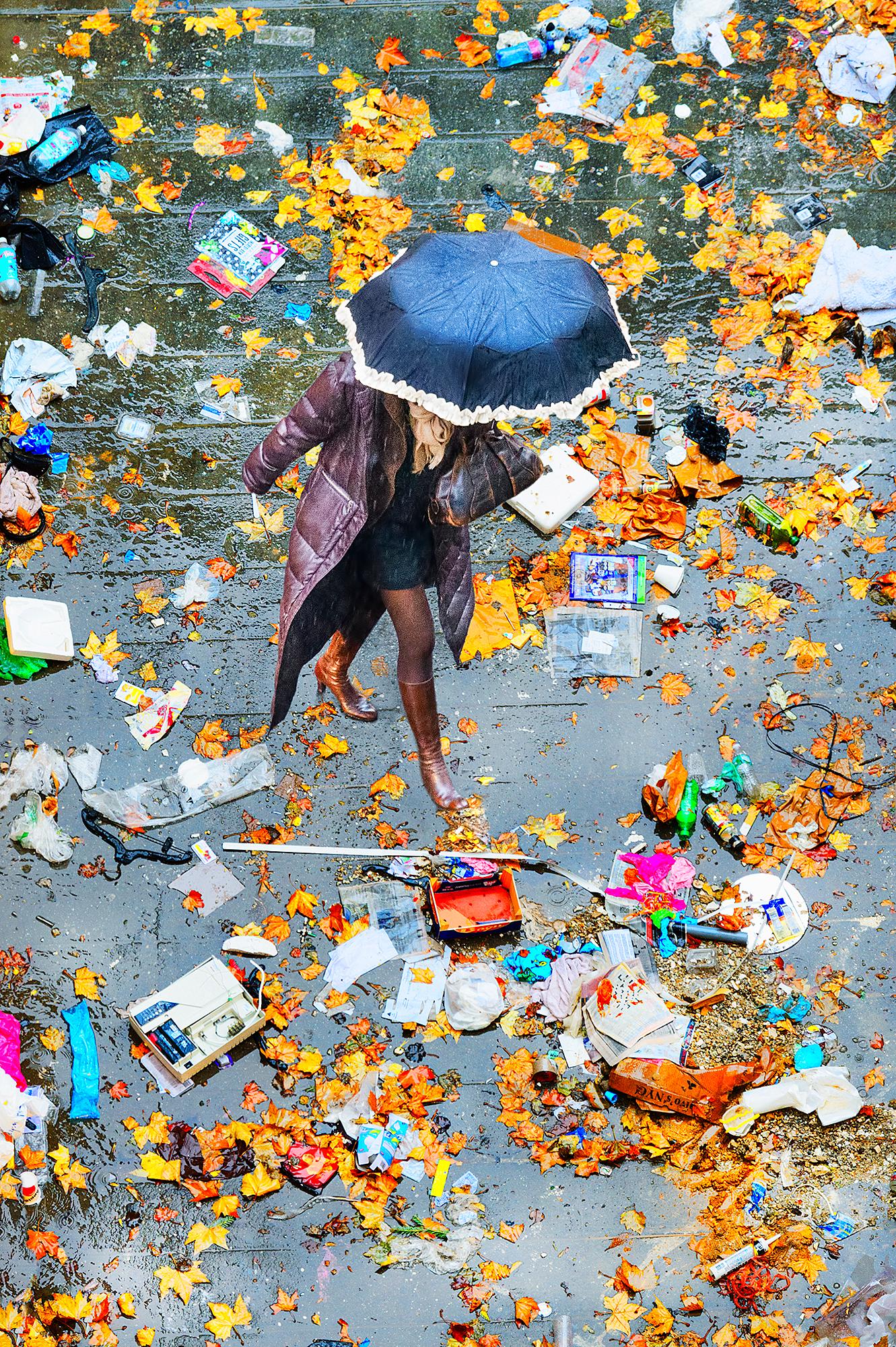 Elevated View Of Women With Umbrella Walking On Scattered Leaves