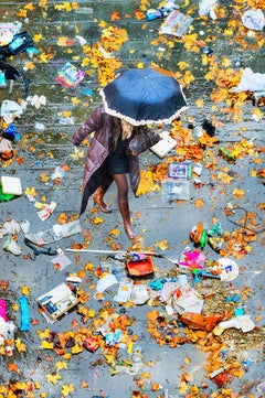 View Elevated of Women With Umbrella Walking On Scattered Leaves