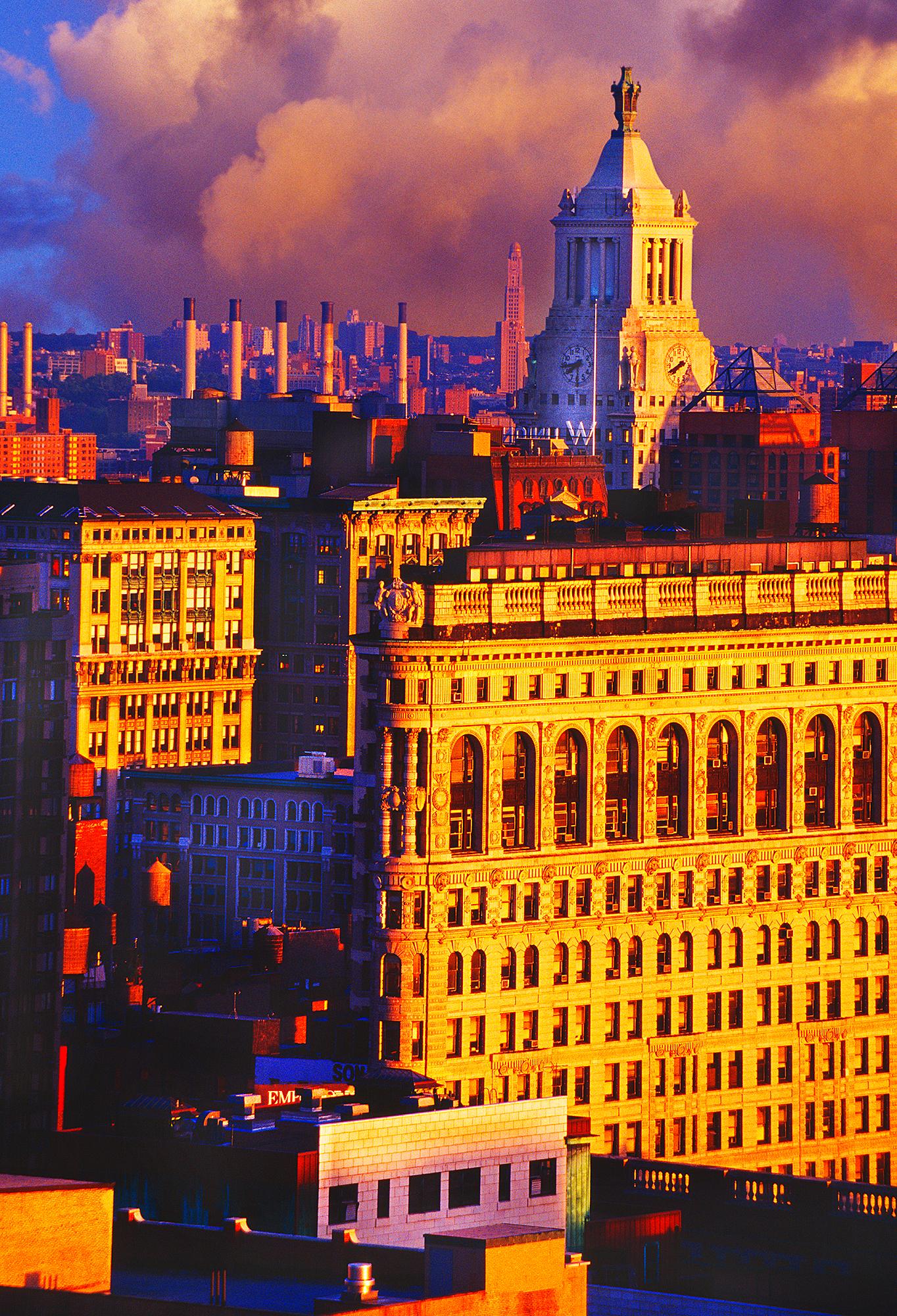 Mitchell Funk Landscape Photograph - Flatiron Building in Golden Light with Williamsburg Tower,  Classic Architecture