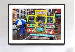 A Contrast of Two Art Styles - Graffiti Bus & Blue Umbrella on Rainy Day