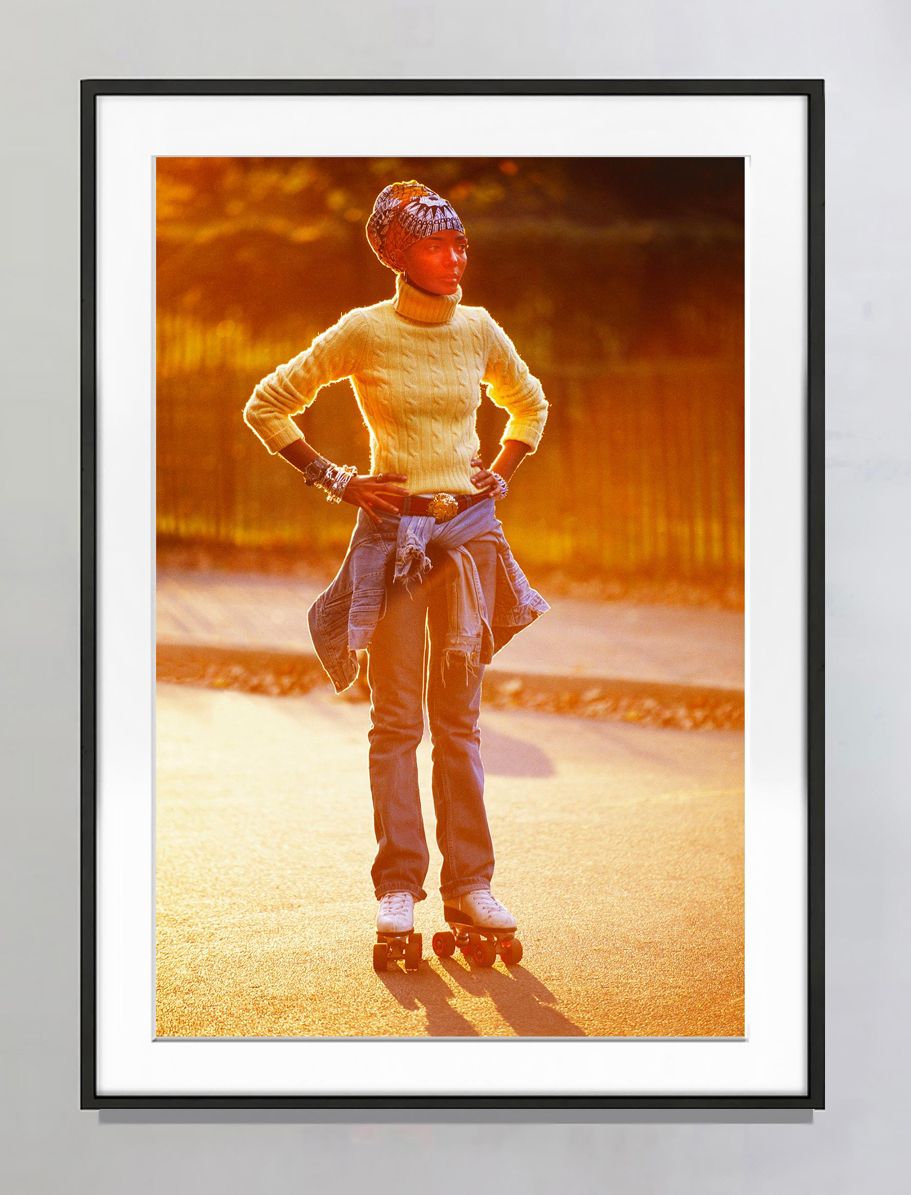 Hip Beautiful Black Female Roller Skates in Central Park Soaked in Golden Light  - Photograph by Mitchell Funk