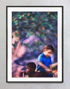 Interracial Friends Lost in Thought in a Brooklyn Playground