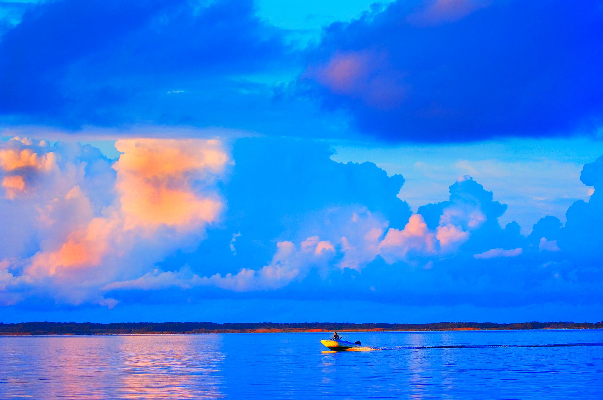 Mitchell Funk Color Photograph - Lone Boat On Gardiners Bay At Sunset, East Hampton - Cerulean Blue Sky