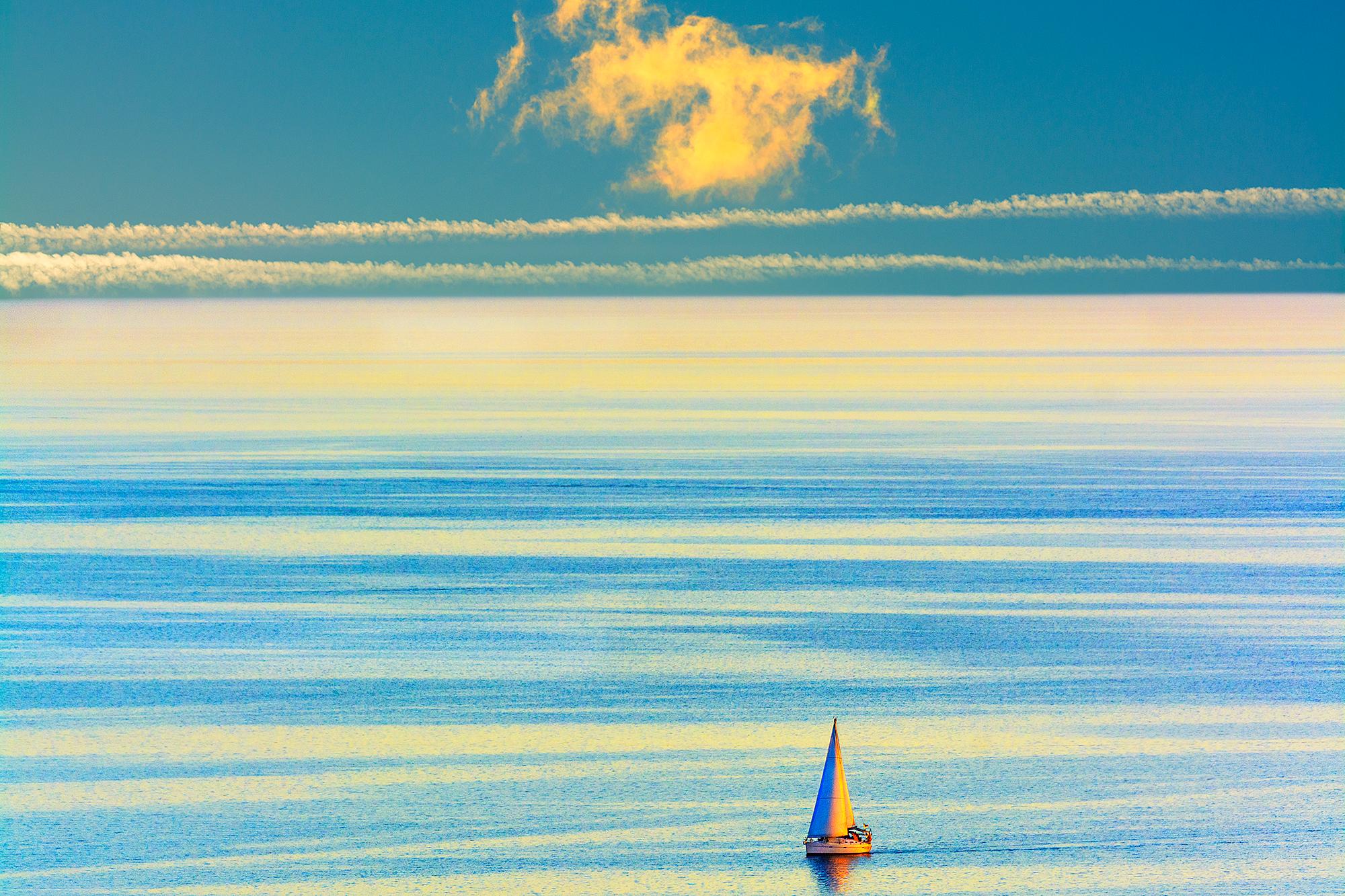 Mitchell Funk Abstract Photograph - Lone Sailboat on a placid turquoise sea