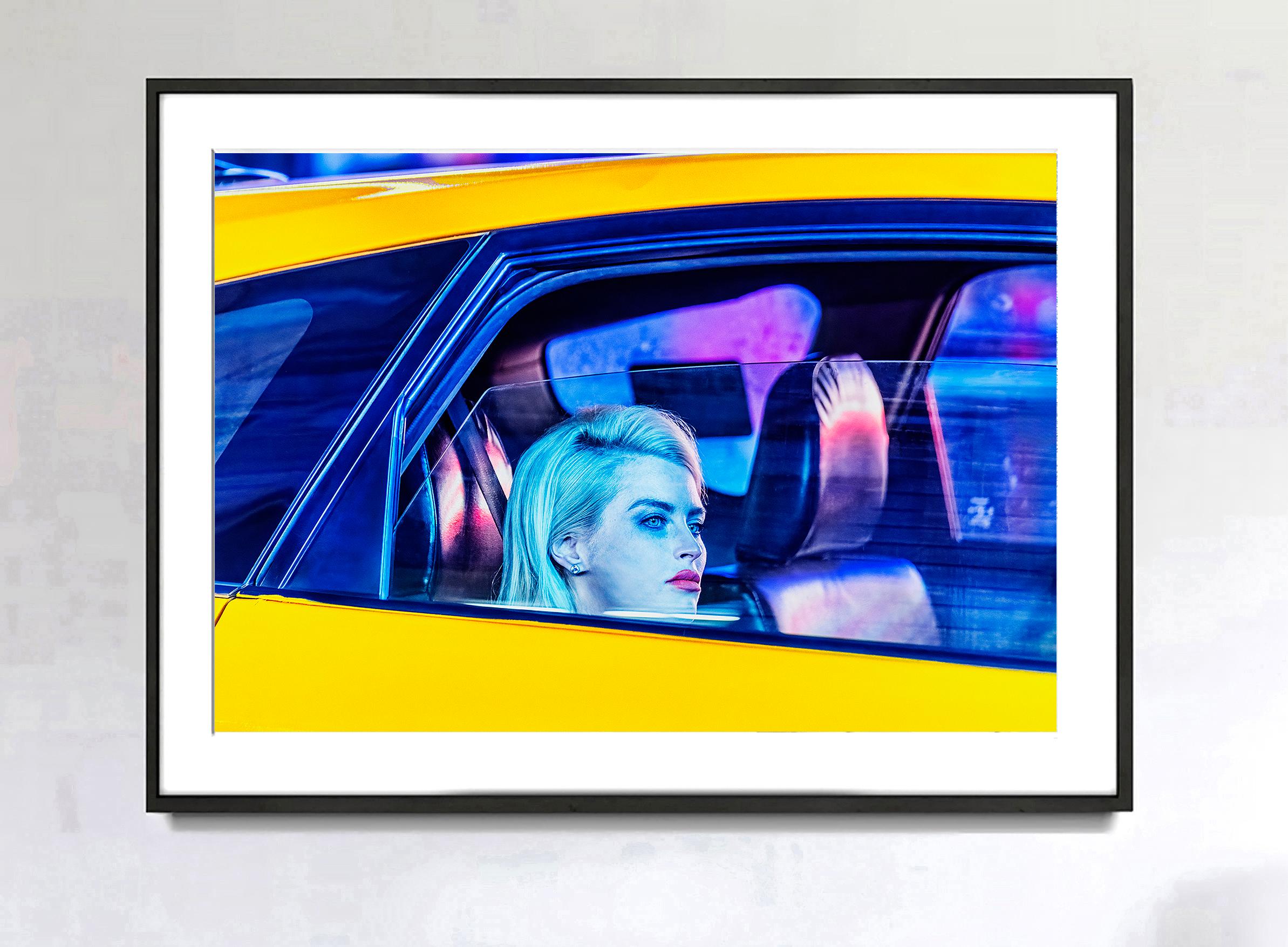 Street Photographer Mitchell Funk's signature hi-color/design photography merges with photojournalism in this introspective New York City Taxi Portrait. 
Signed,  dated, numbered lower right  2/15 Printed later, other sizes available, unframed  -