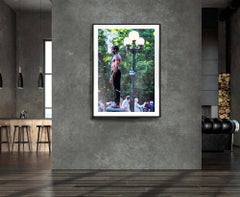 Muscular Black Man Pondering in the Fountain's Mist