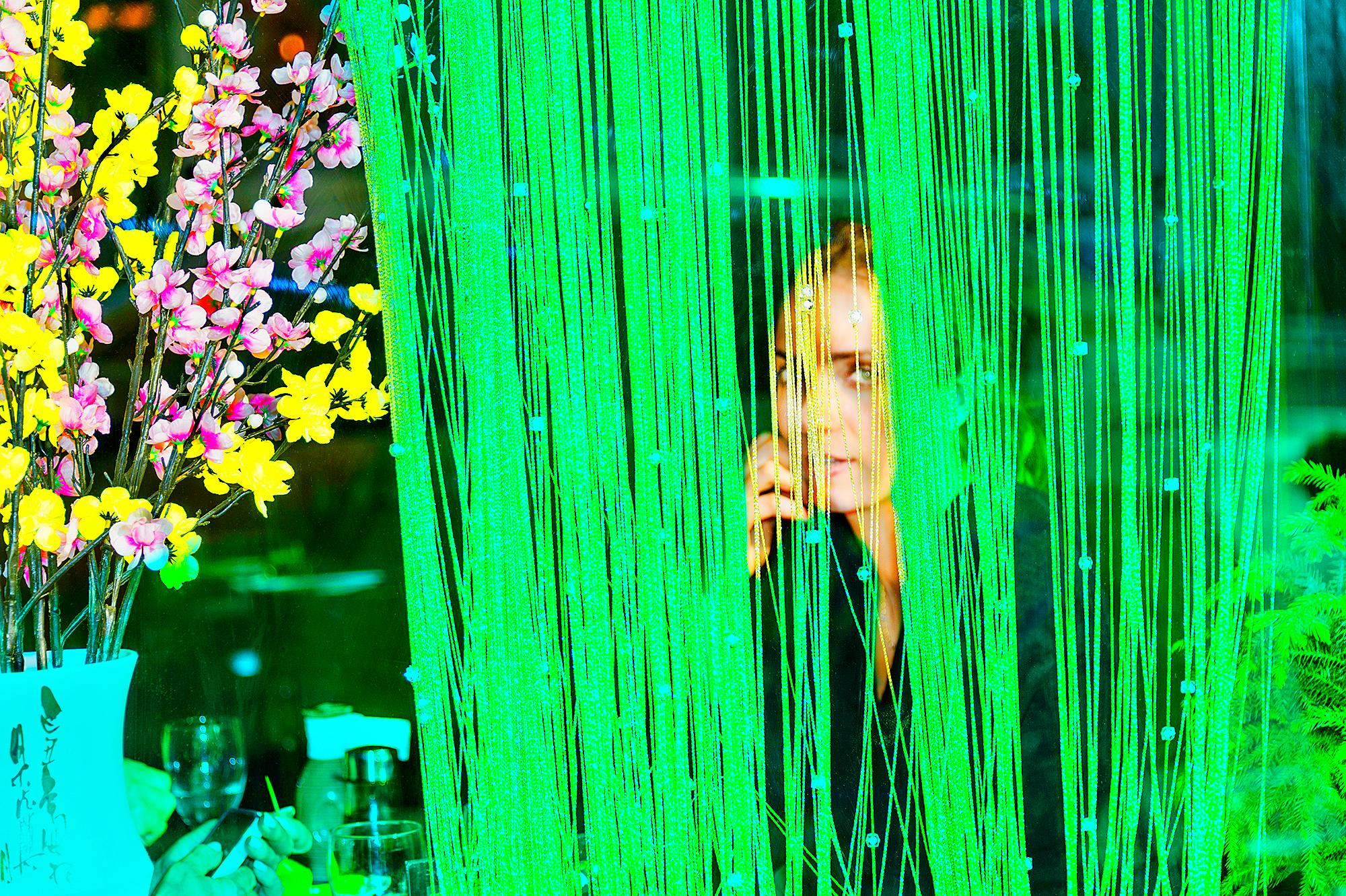 Mysterious Beautiful Young Woman Peers though and Green Blinds, Fine Art Photo