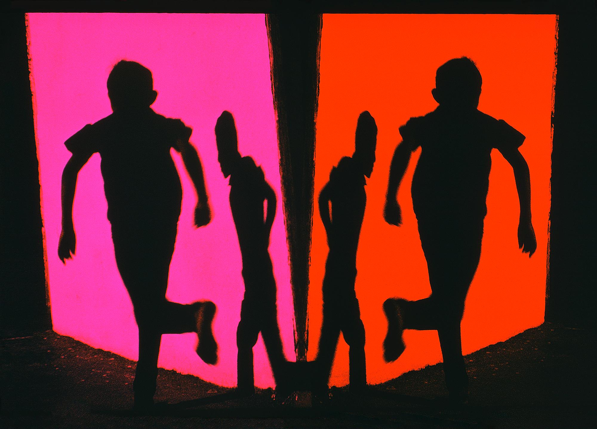Silhouette of Running boy. Pink and Magenta Wall Guaymas Mexico