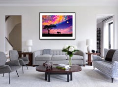 Le lion silhouette sur les vols d'Afrique au coucher du soleil