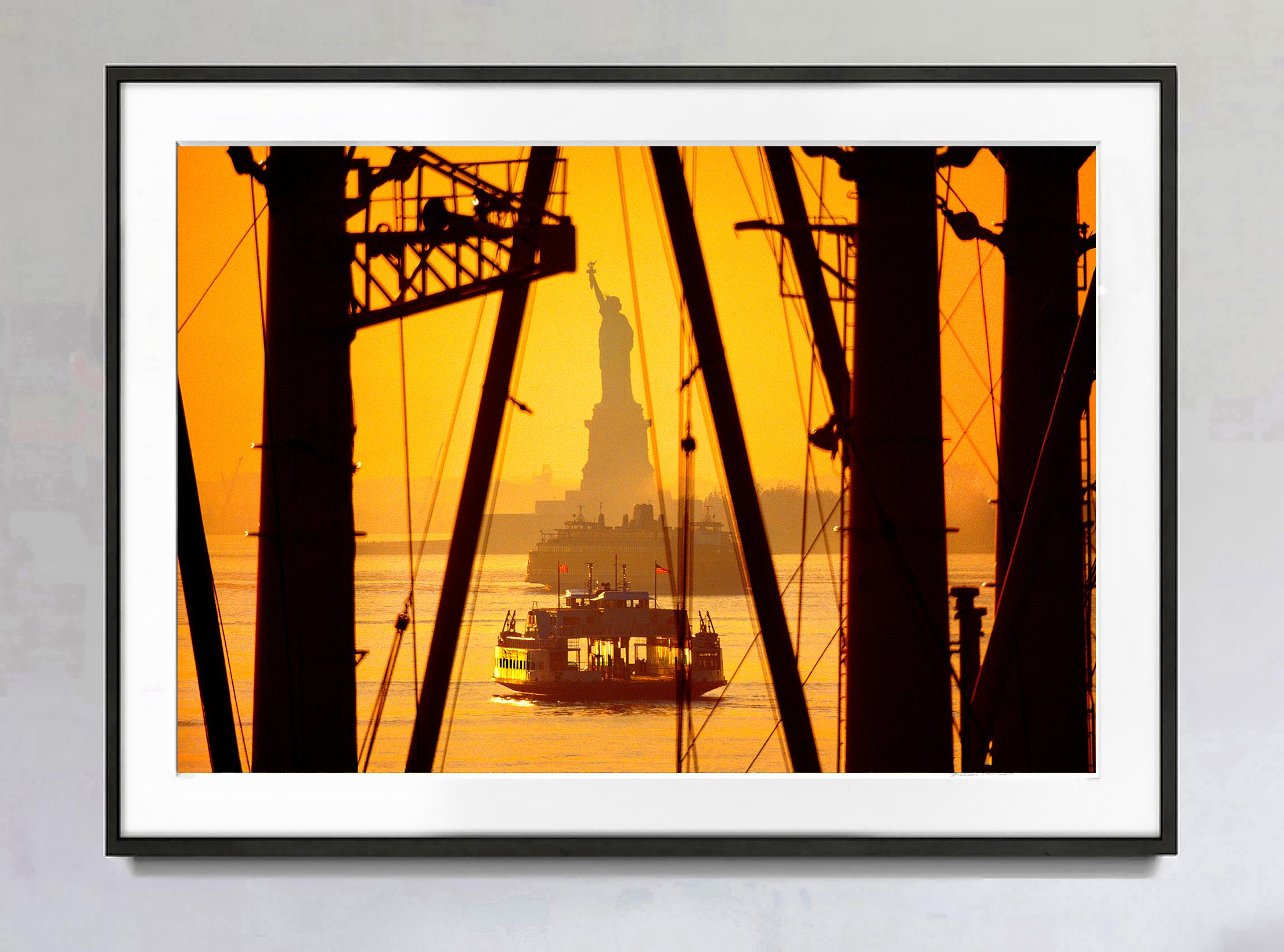 Statue of Liberty in New York Harbor at Sunrise  Staten Island Ferry  - Photograph by Mitchell Funk