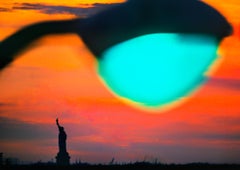 Retro Statue of Liberty New York Harbor at Sunset with Green Light 