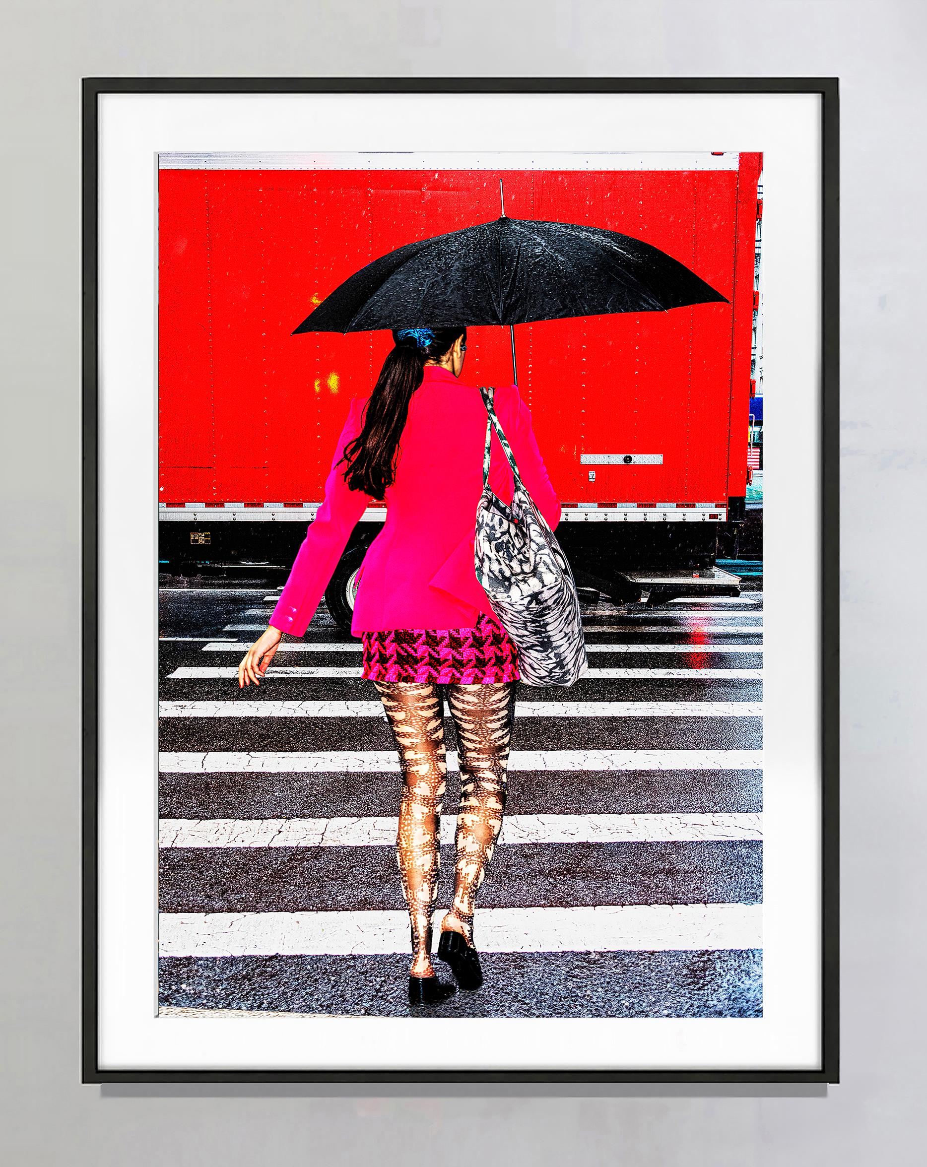 Street Fashionista in Pink Ensemble on New York City Rainy Day  - Photograph by Mitchell Funk