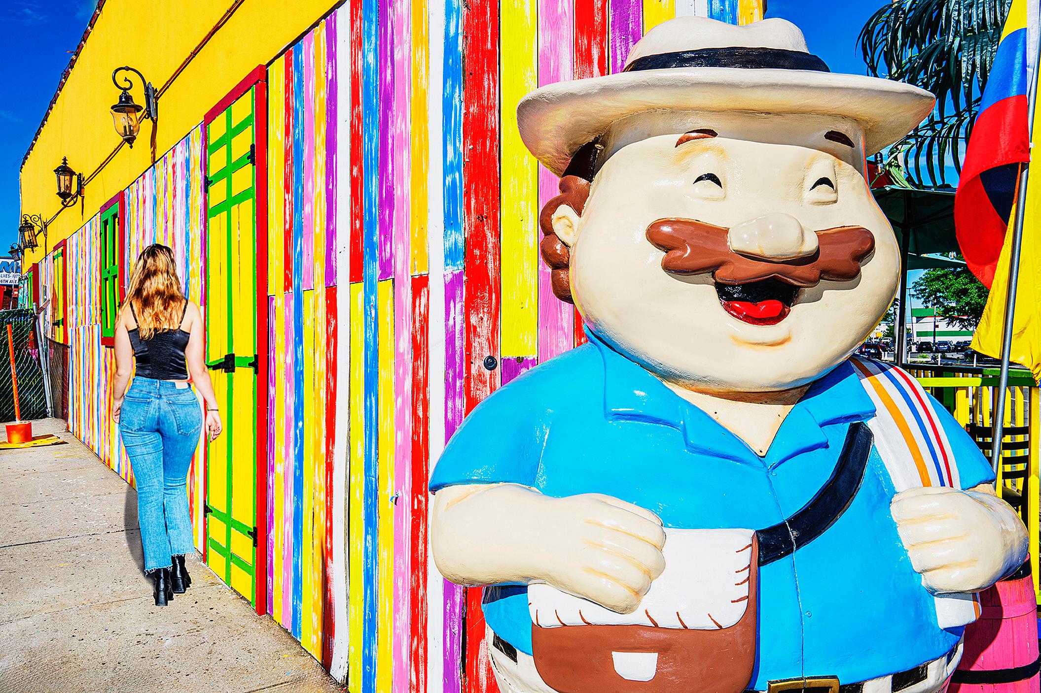 Mitchell Funk Landscape Photograph – Surreal Encounter: Street Photography of Sexy Girl and Clown