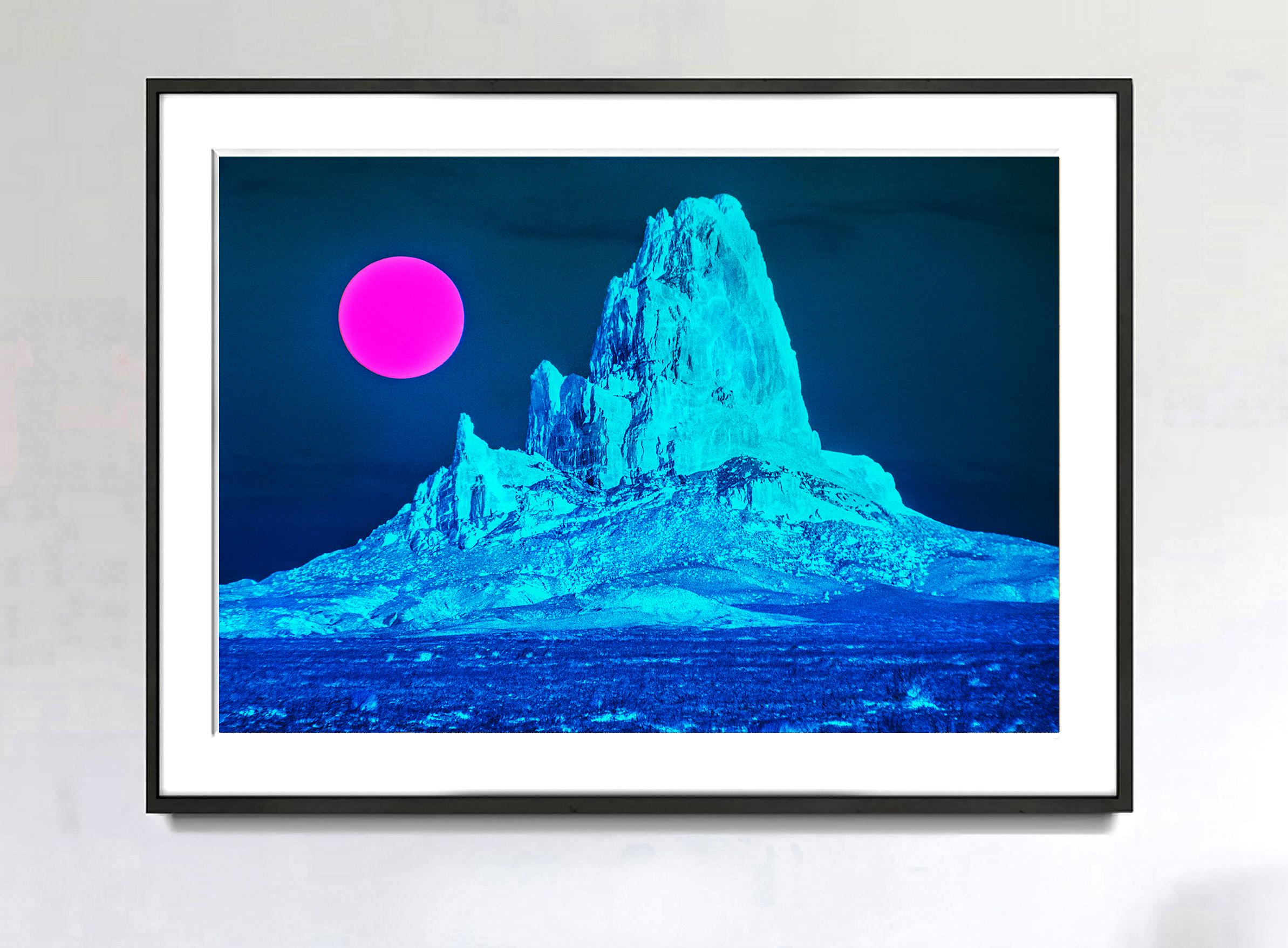Surreal Desert Landscape with Blue Mountain and Magenta Moon - Monument Valley  - Photograph by Mitchell Funk