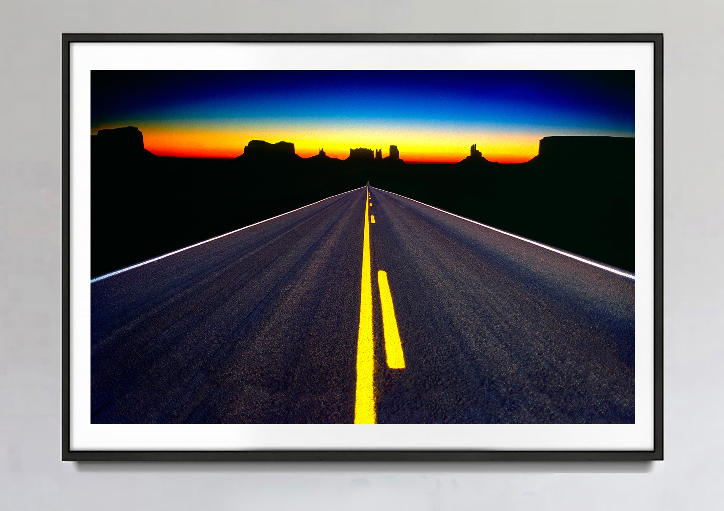 The Road To Monument Valley - Surreal Road in Desert - Photograph by Mitchell Funk