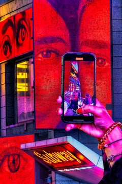 Times Square Cell Phone in Neon Reds  - Street Photography