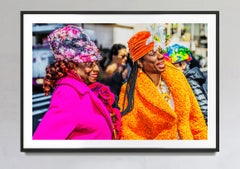 Two African American Women Shine in Pink and  Orange on Easter Day Parade