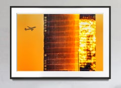 Urban Landscape Golden Sky with Melting and Dissolving Glass Skyscraper