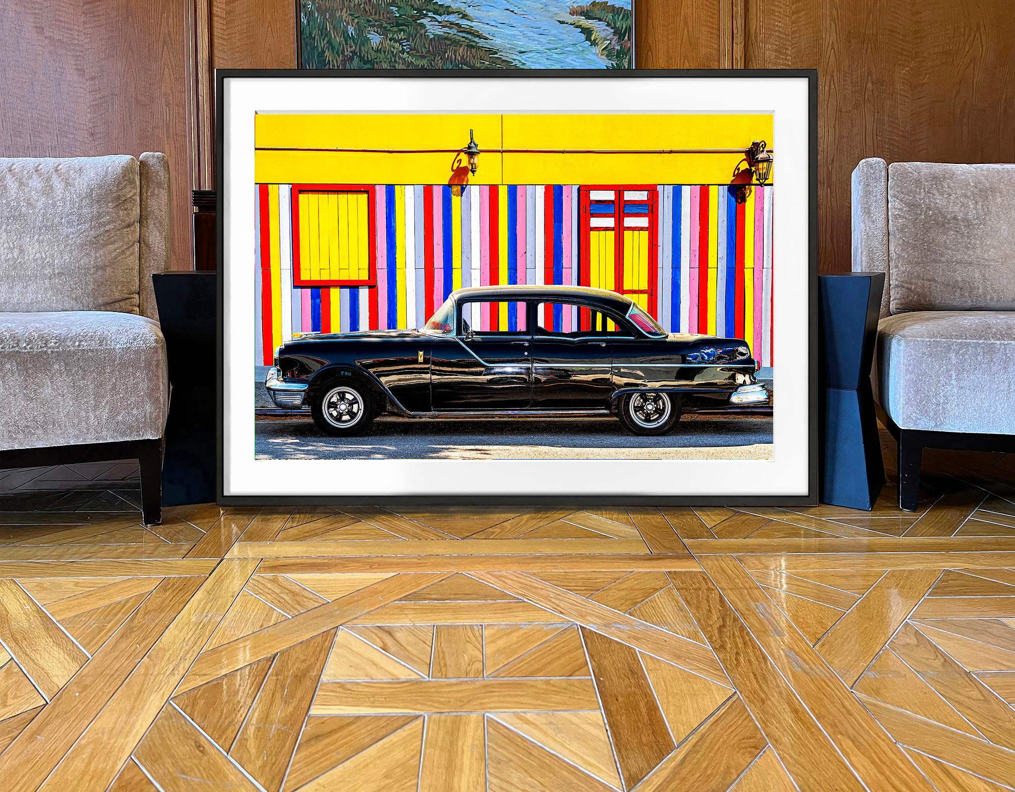 Vintage Car Against Colorful Striped  Yellow Wall   - Primary Colors - Abstract Geometric Photograph by Mitchell Funk