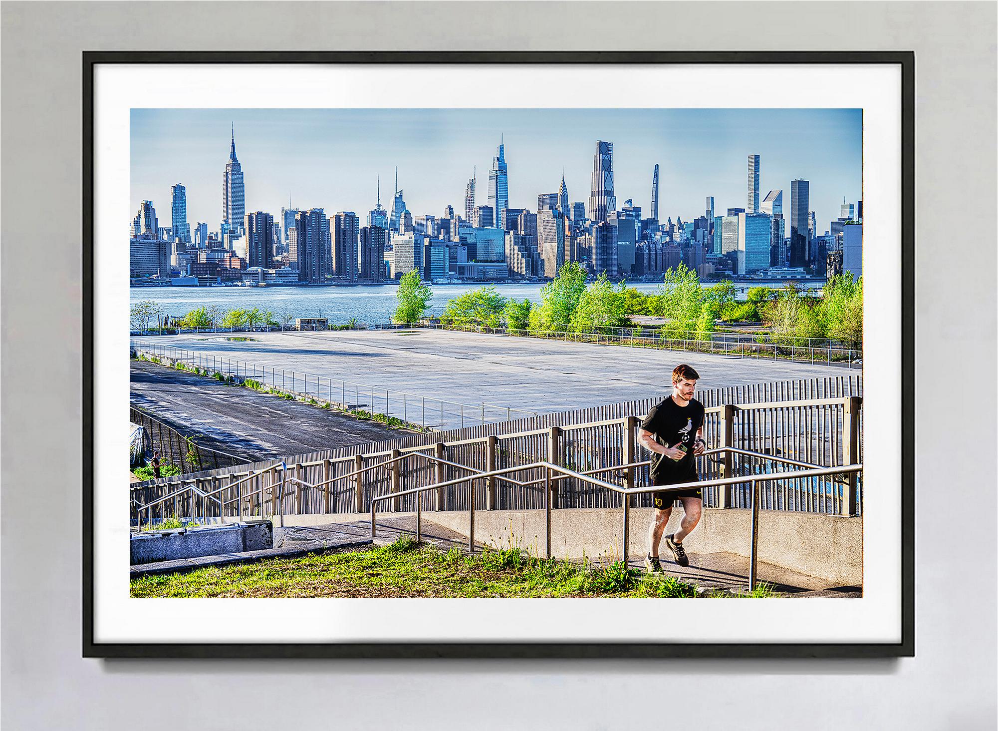 One man is among many buildings.
The image is part of a new epic exhibition, Mitchell Funk Photographs The Chrysler Building for 50 Years.
The Chrysler Building is one of the most photographed buildings in the world. Yet Mitchell Funk's photographs
