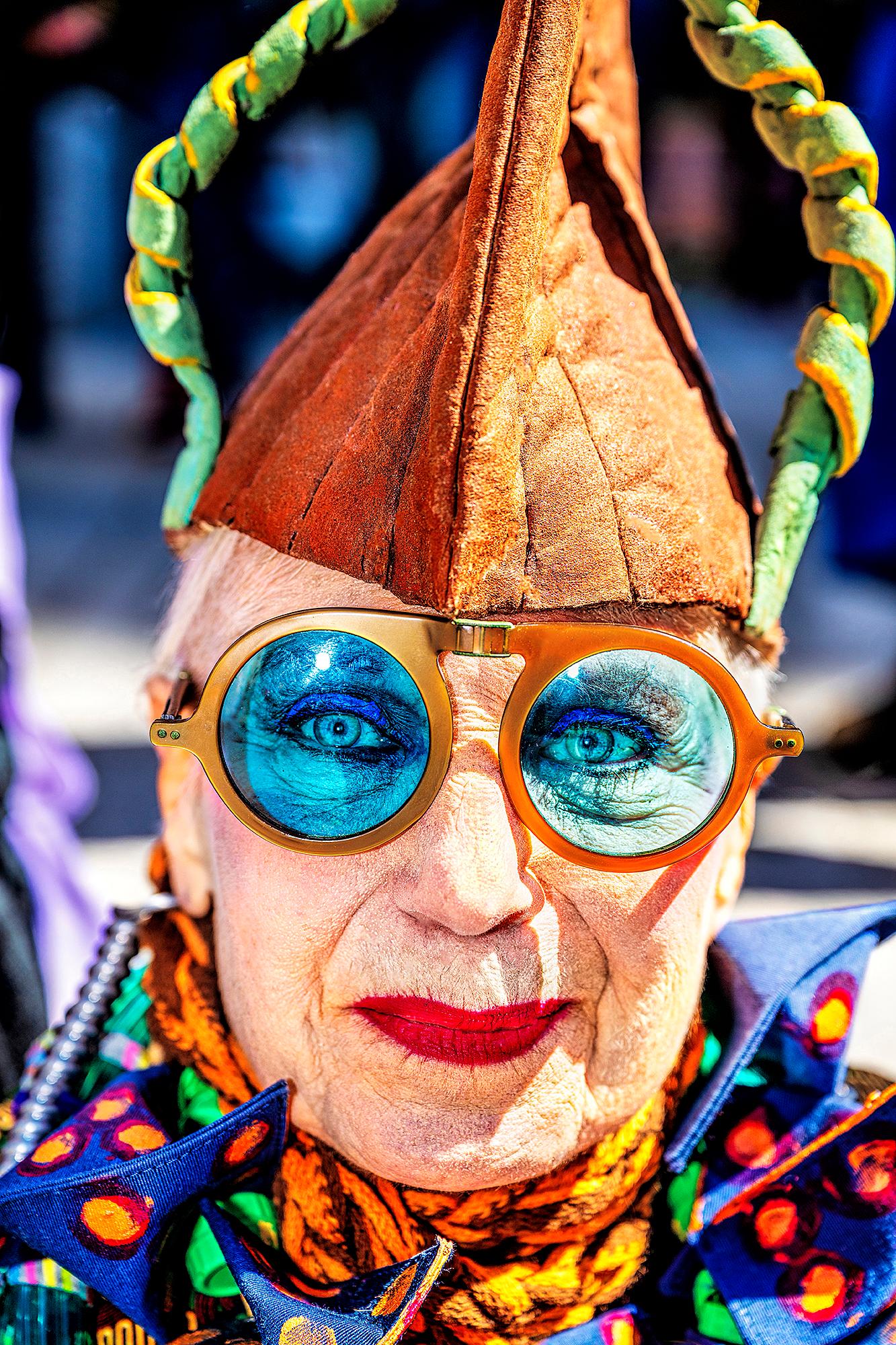 Mitchell Funk Portrait Photograph - Whimsical Woman with Colorfully Fanciful Outfit Blue Eyeglasses