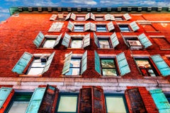 Used Windows with open shutters lower Manhattan