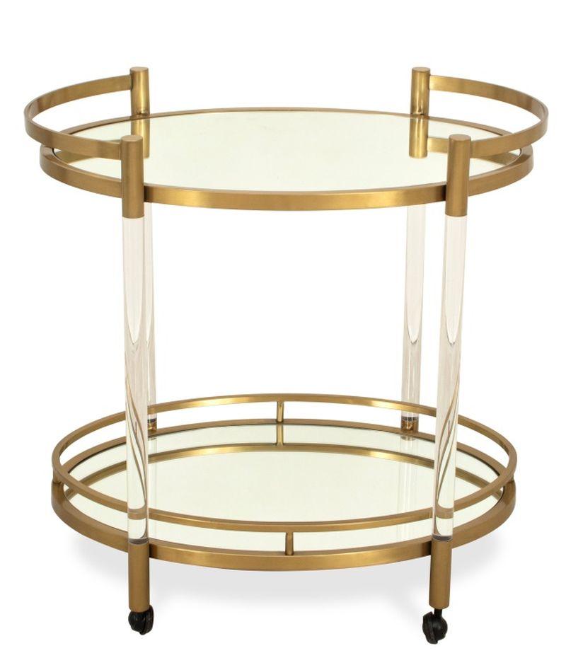 Mitchell Gold + Bob Williams Art Deco Brass Two-Tiered Oval Bar Cart, étagères en verre miroir, quatre supports en acrylique transparent sur quatre roulettes, avec plaque sur le dessous. 31.25