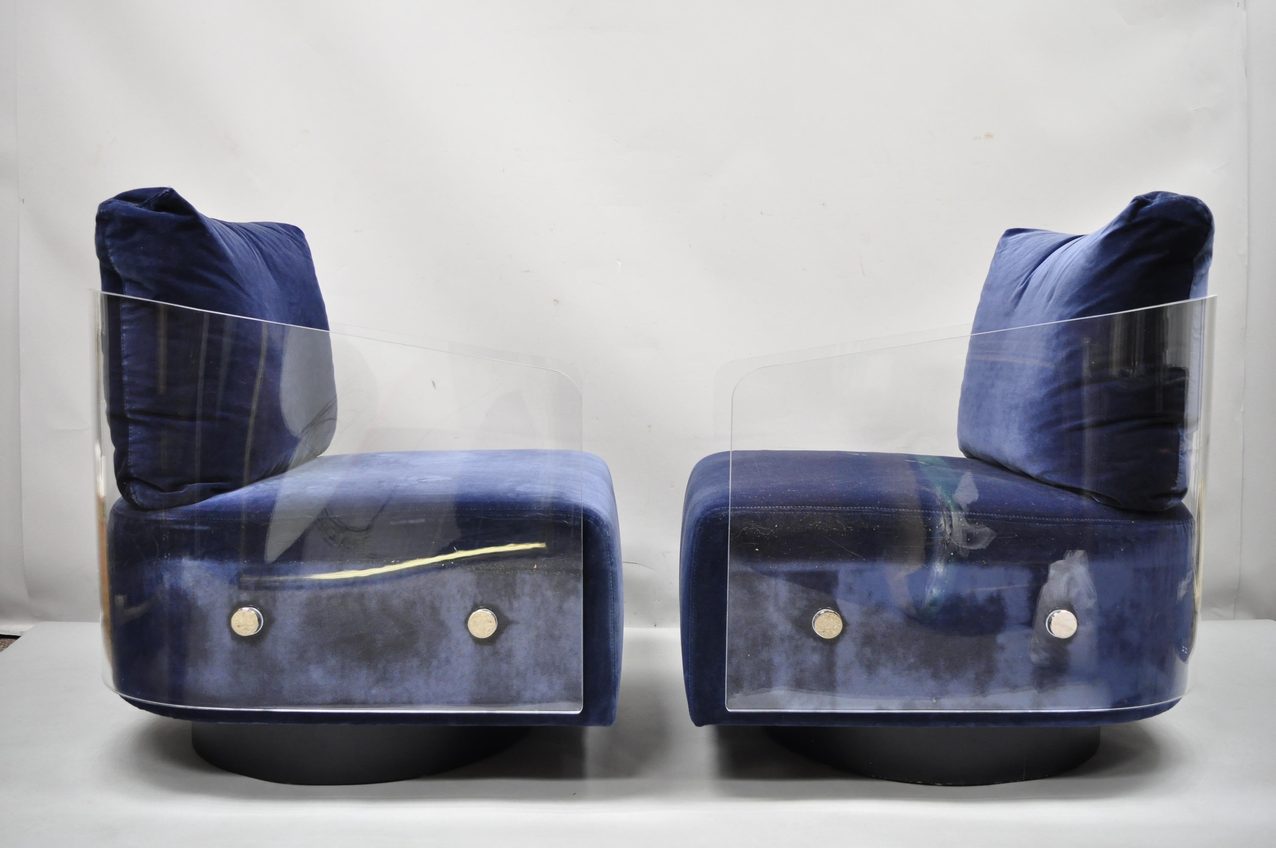 Mitchell Gold & Bob Williams Lucite Lucy swivel blue club lounge chairs - a pair. Item 1970s inspired, thick heavy lucite construction, black round swivel pedestal base, blue upholstery, original label, very nice pair, quality American