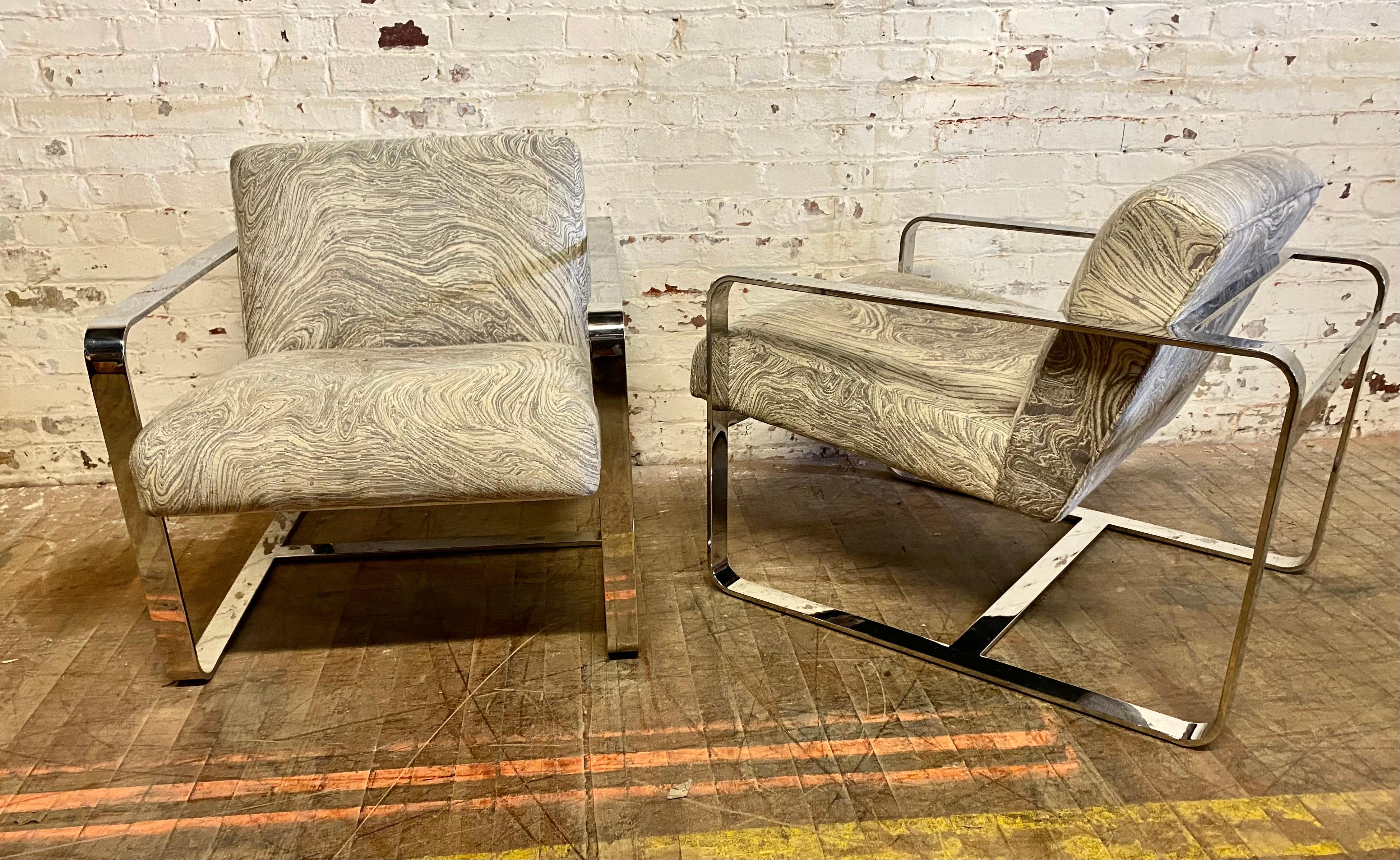 Matched pair Mitchell Gold & Bob Williams Modernist, Art Deco style lounge chairs. Amazing design. Superior quality and construction. Extremely comfortable. Hand delivery avail to New York City or anywhere en route from Buffalo NY.