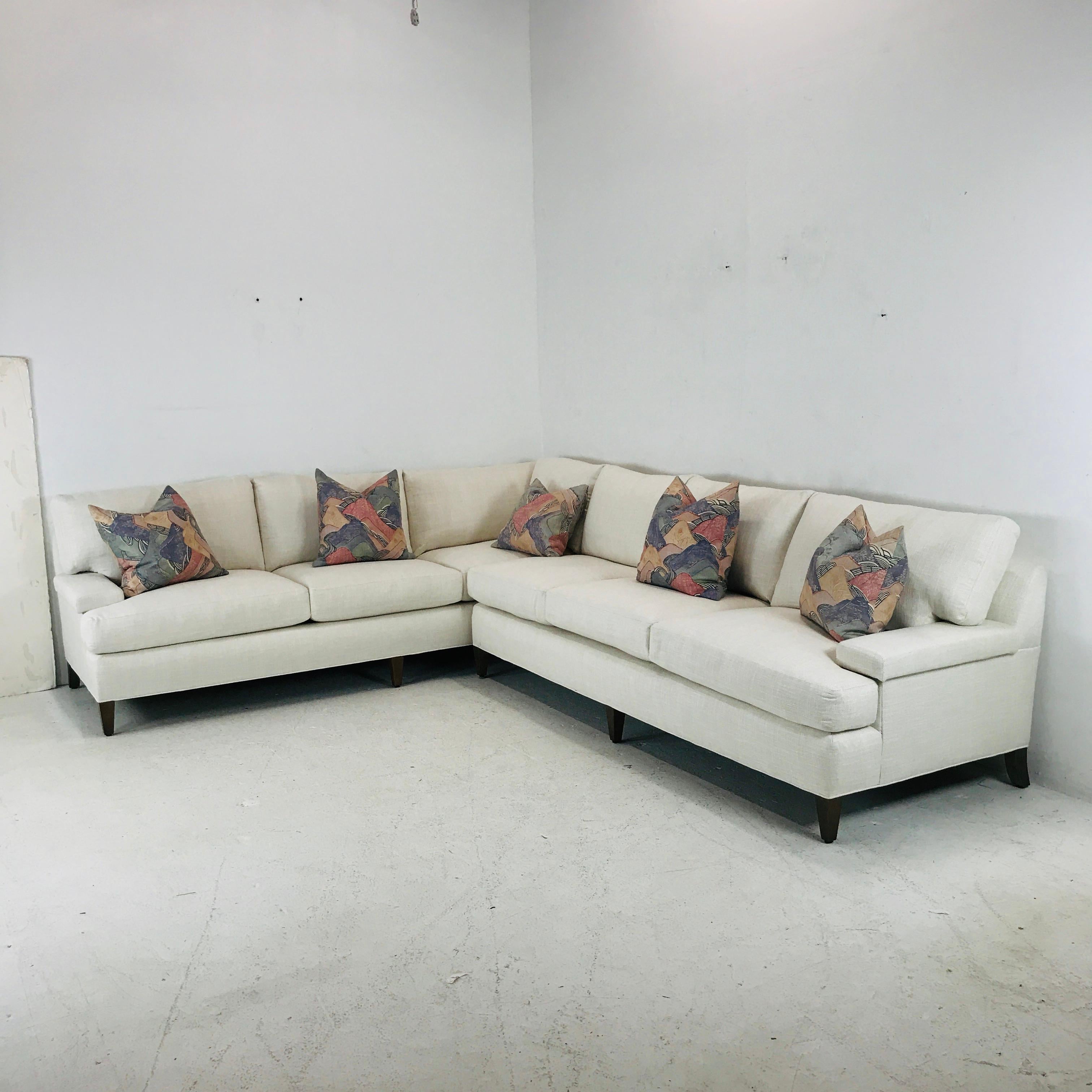 Brand new, never used Mitchell gold 2-piece white sectional sofa. Measures: 126